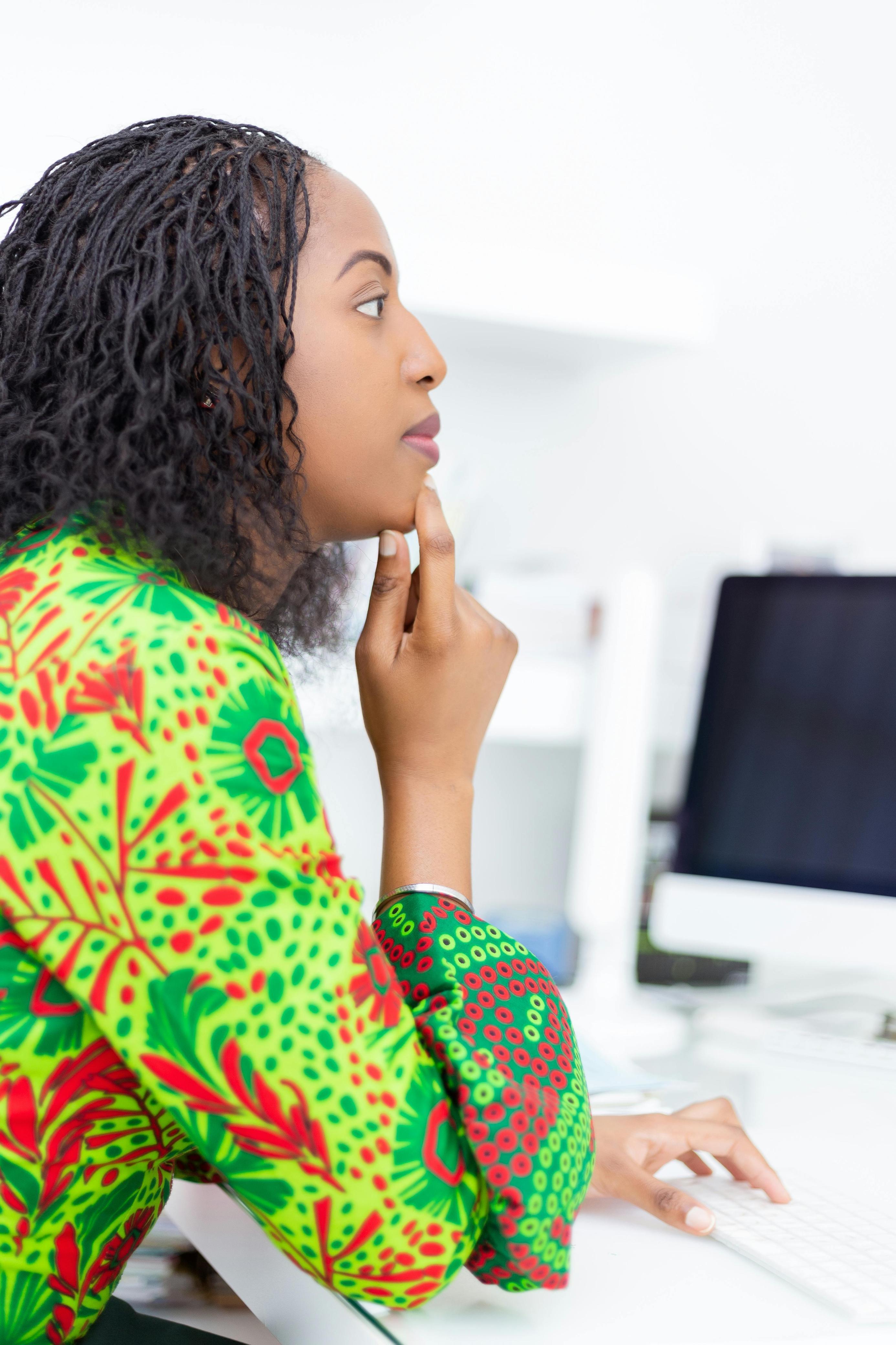 A seller working at her computer